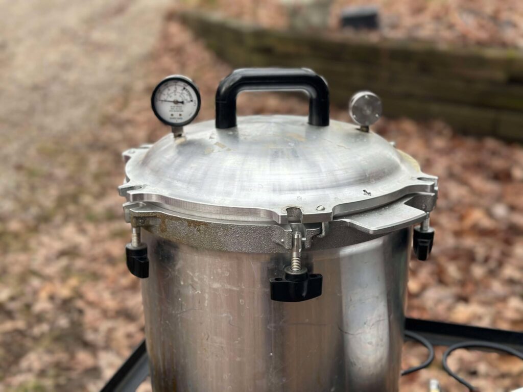 stove top pressure canner onto of outdoor cooker