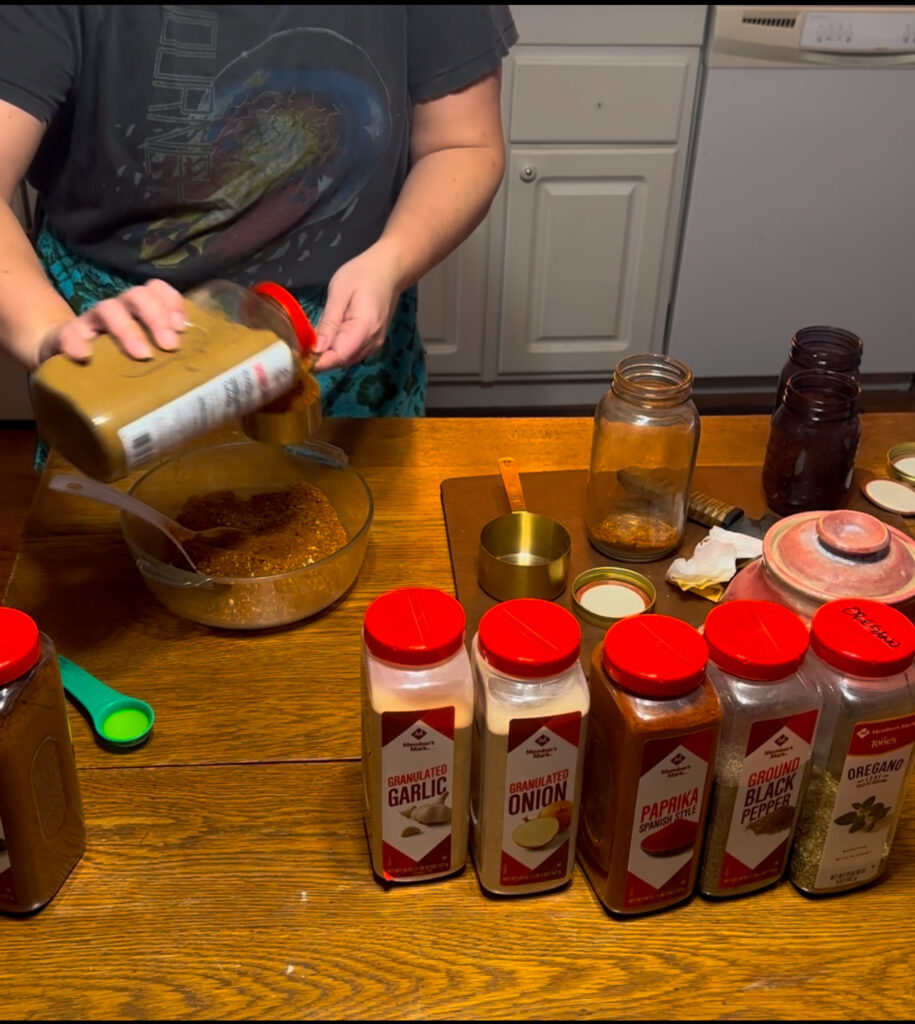 seasonings on a table with a bowl and measuring cups